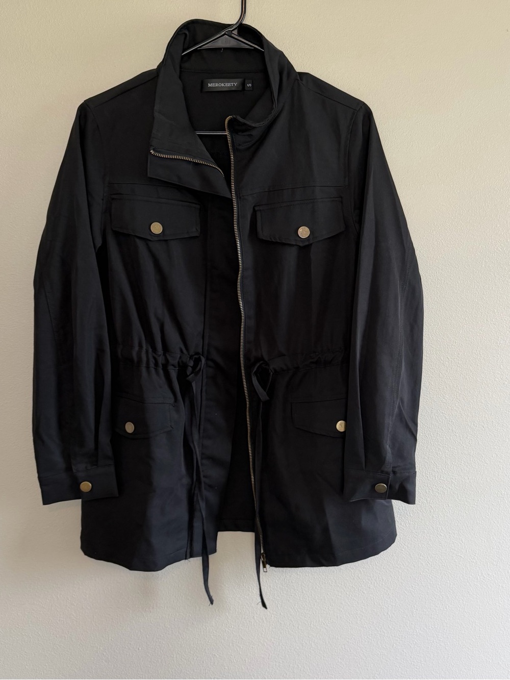 Merokeety Black Jacket with Gold Zipper Accent